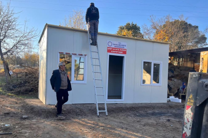 Tavas Belediyesinden yangında evleri kül olan aileye konteyner ev desteği